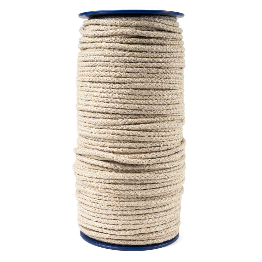 Spool of hemp rope on a white background