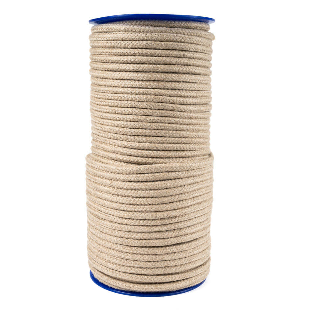 Spool of hemp beige rope with on a blue spool on a white background